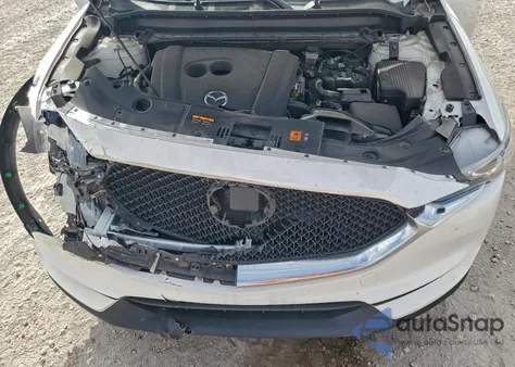 2021 Mazda Cx-5 Sport z USA, uszkodzony, nr VIN JM3KFABM3M1377328